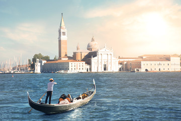 Fototapeta na wymiar Venice gondola tour at sunset