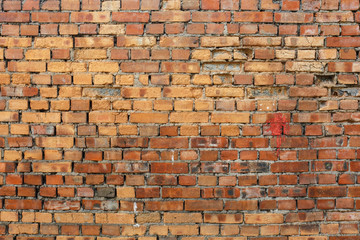 Naklejka premium Red brick wall background