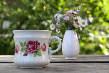 Old cup in the garden.