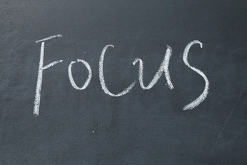 focus word write on blackboard