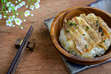 Salt and black pepper grilled pork with Japanese Rice in wooden