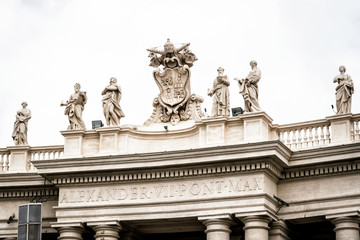 Statues on colonnades that surround St. Peter's Square in Rome
