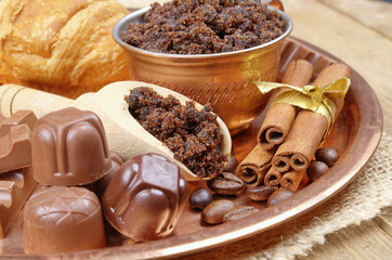 Brown sugar, cinnamon sticks and coffee beans, chocolate candy 