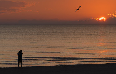 Sunset at sandy beach of the Baltic Sea