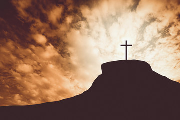 Vintage tone of cross on a hill - obrazy, fototapety, plakaty