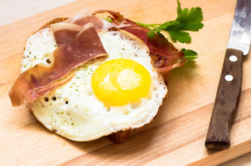 Tapas fried bread with egg and jamon