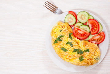 Omelet with cheese and vegetables