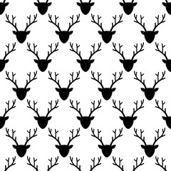 Deer head silhouette seamless pattern in black and white. Animal head texture.