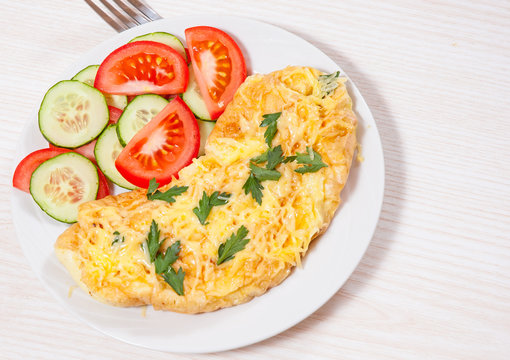 Omelet with cheese and vegetables