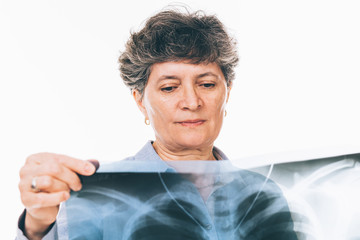 Woman looking at lungs x-ray