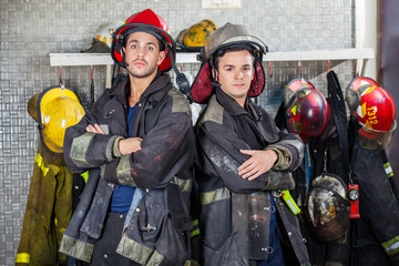 Confident Firemen Standing Arms Crossed