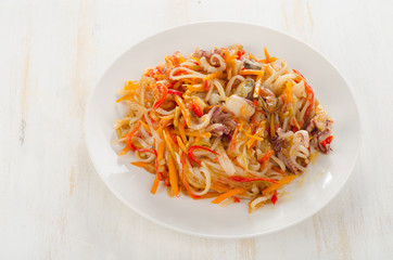 Rice noodles with vegetables and seafood.