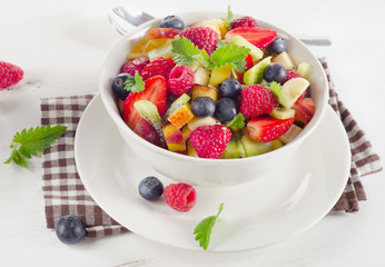 Healthy salad with fruits and berries.