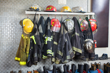 Fototapeta premium Firefighter Uniforms Arranged At Fire Station