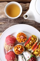 Fototapeta na wymiar Indian sweets with hot tea