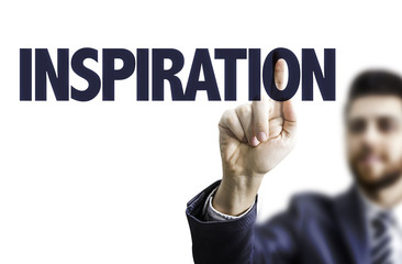 Businessman pointing the text: Inspiration