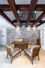 office room interior with desk and armchair