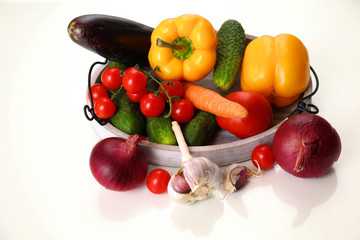 Fresh autumn vegetables on a white background