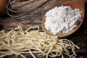 Making noodle with eggs and wheat flour