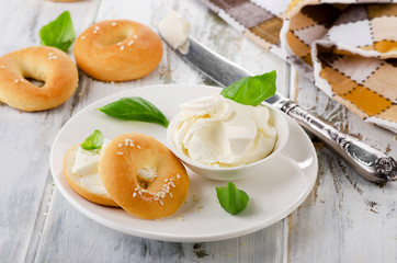 Fresh bagel with cream cheese for breakfast.
