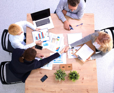 Business Meeting At The Table Top View