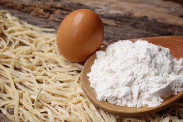 Making noodle with egg and wheat flour