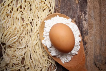 Making noodle with egg and wheat flour