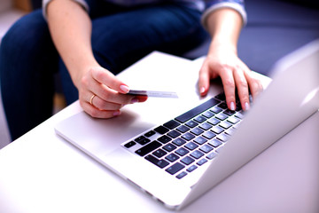 Young businesswoman working on a laptop