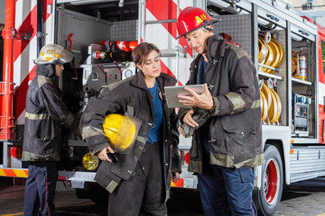 Firefighters Using Tablet Computer