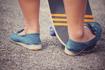 Young girl with skateboard