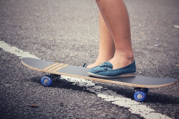 Young girl with skateboard