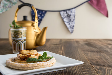 Apple cake with mint with tea