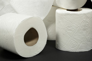 Detail of embossed decorative patterns of white toilet rolls