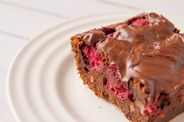 Brownie with raspberries