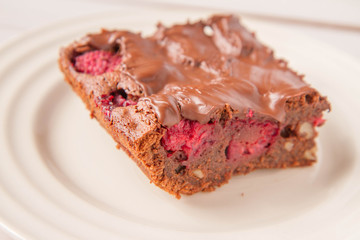 Brownie with raspberries