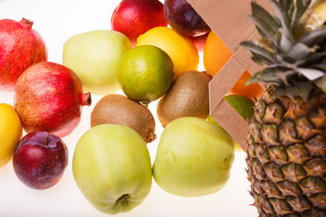 Fresh citrus fruits and packet