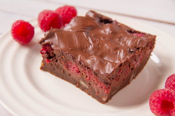 Brownie with raspberries