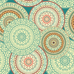 Mandala. Indian, Arabic, Persian pattern. Arabesque. Colorful seamless background with circular ornaments in ethnic style.