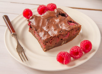 Brownie with raspberries