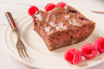 Brownie with raspberries
