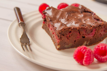 Brownie with raspberries