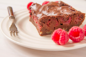 Brownie with raspberries