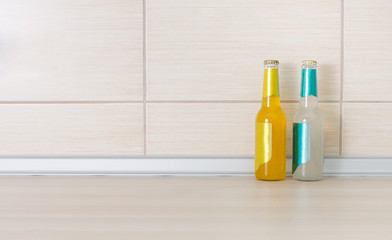 Bottles of drink on kitchen countertop