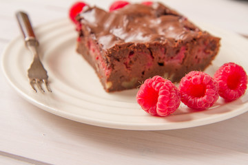 Fototapeta na wymiar Brownie with raspberries