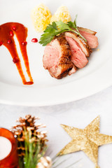 roasted duck breast on Christmas table