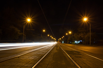 Fototapeta na wymiar Night, tramways, lines of light