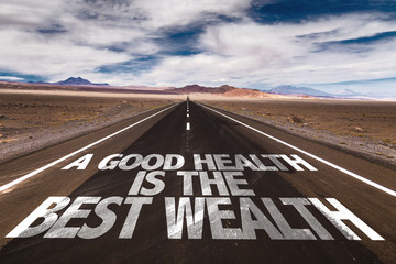 A Good Health is the Best Wealth written on desert road