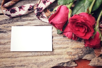 Blank card with red roses