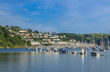 Fototapeta na wymiar Boats Moored on the Dart Estuary at Kingswear and Dartmouth, Devon, United Kingdom