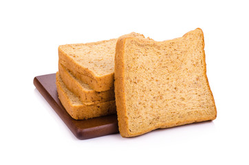 Slice of a whole wheat bread isolated on a white background
